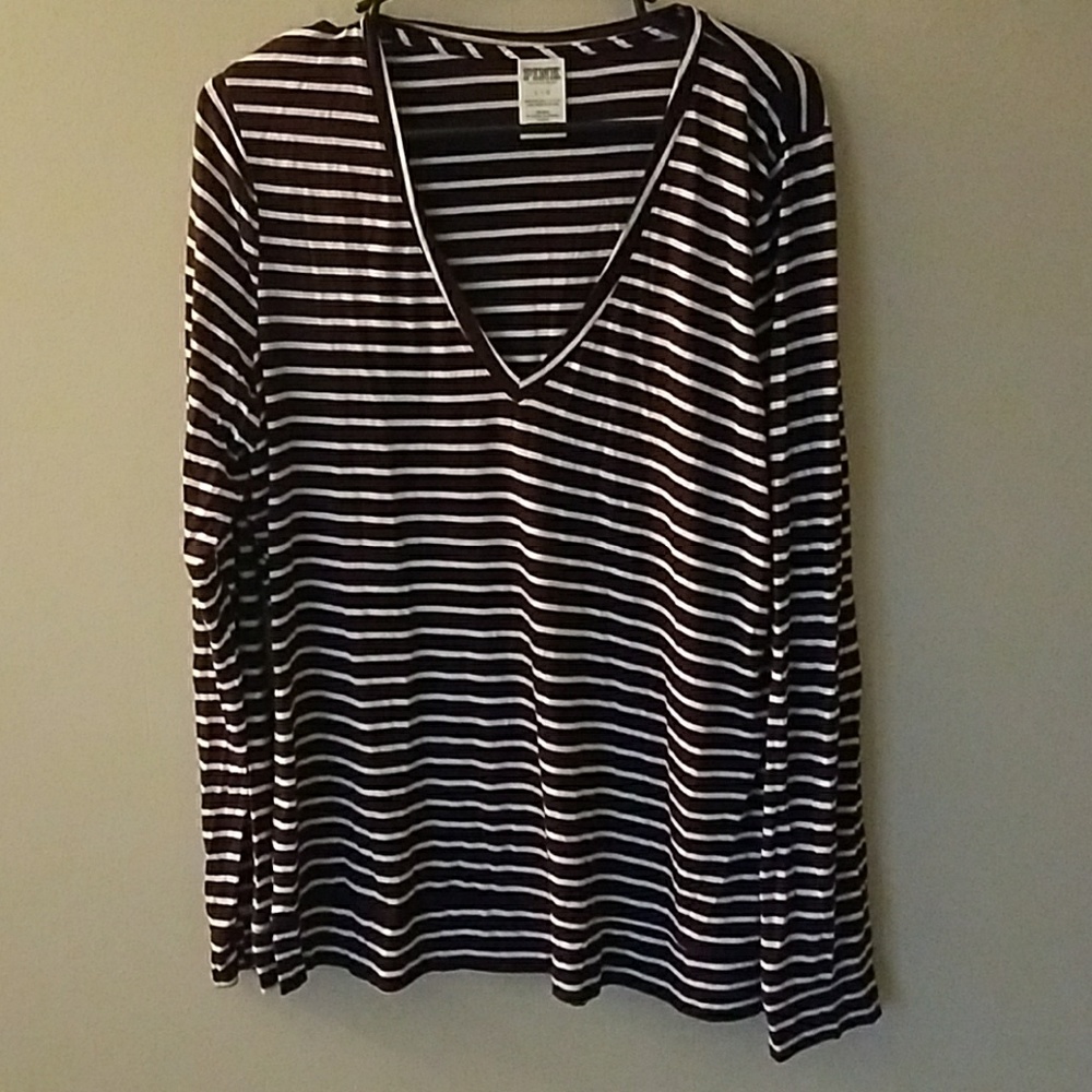Pink long sleeve top.